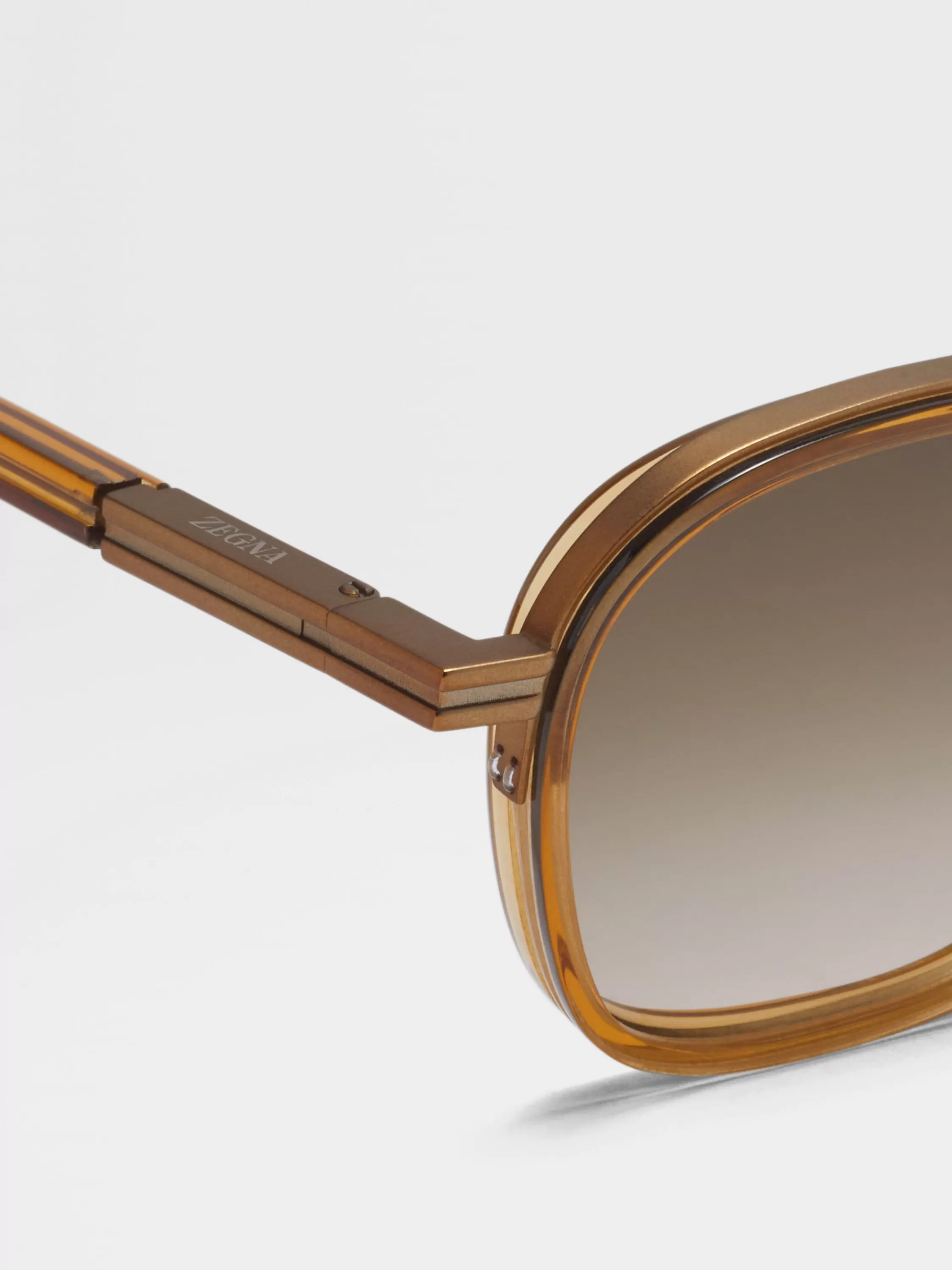 Outlet Orizzonte I Sonnenbrille aus Metall und Acetat in transparentem Golden Syrup Sonnenbrillen