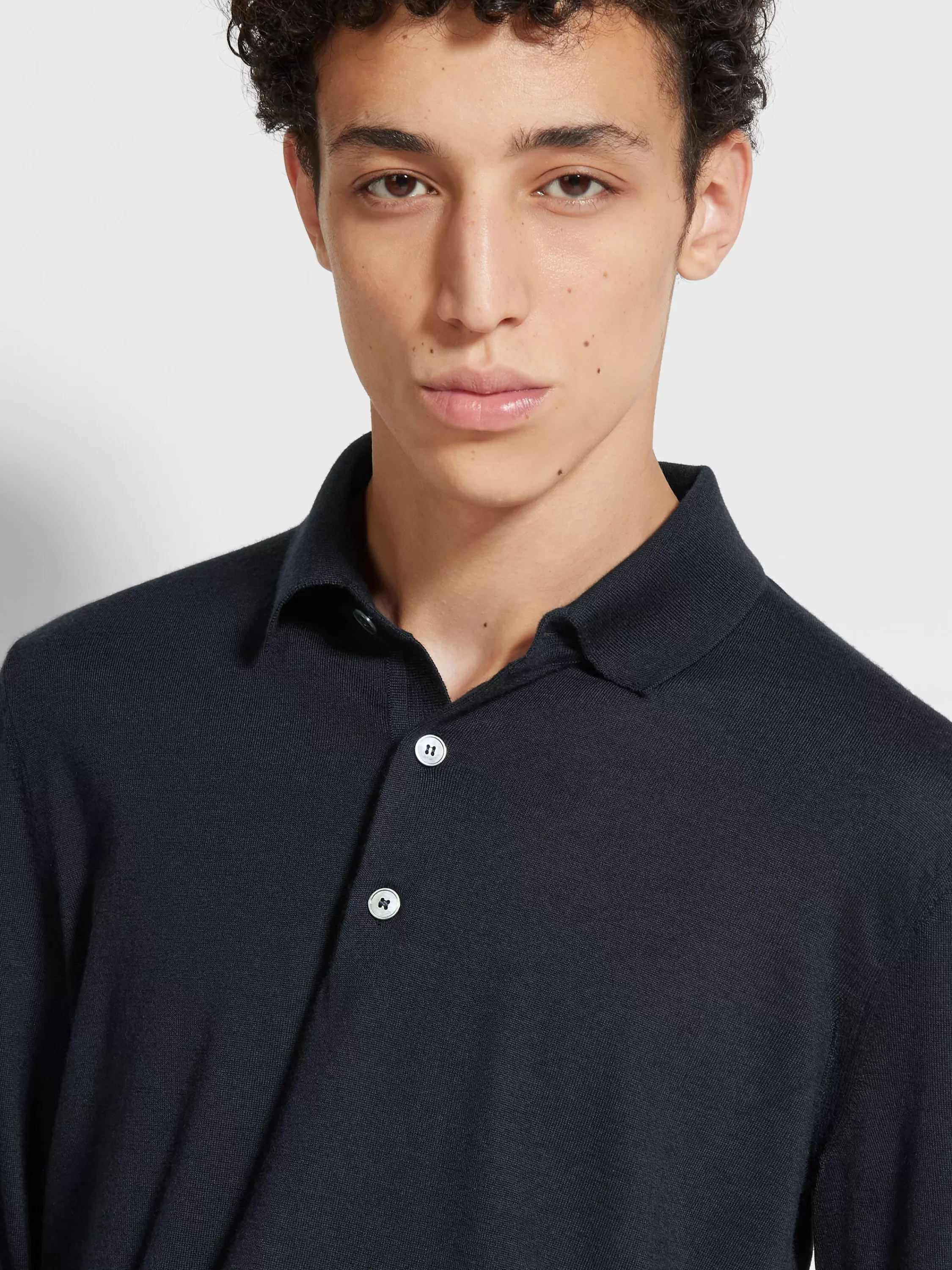 New Poloshirt aus Cashseta in meliertem Marineblau Strickwaren