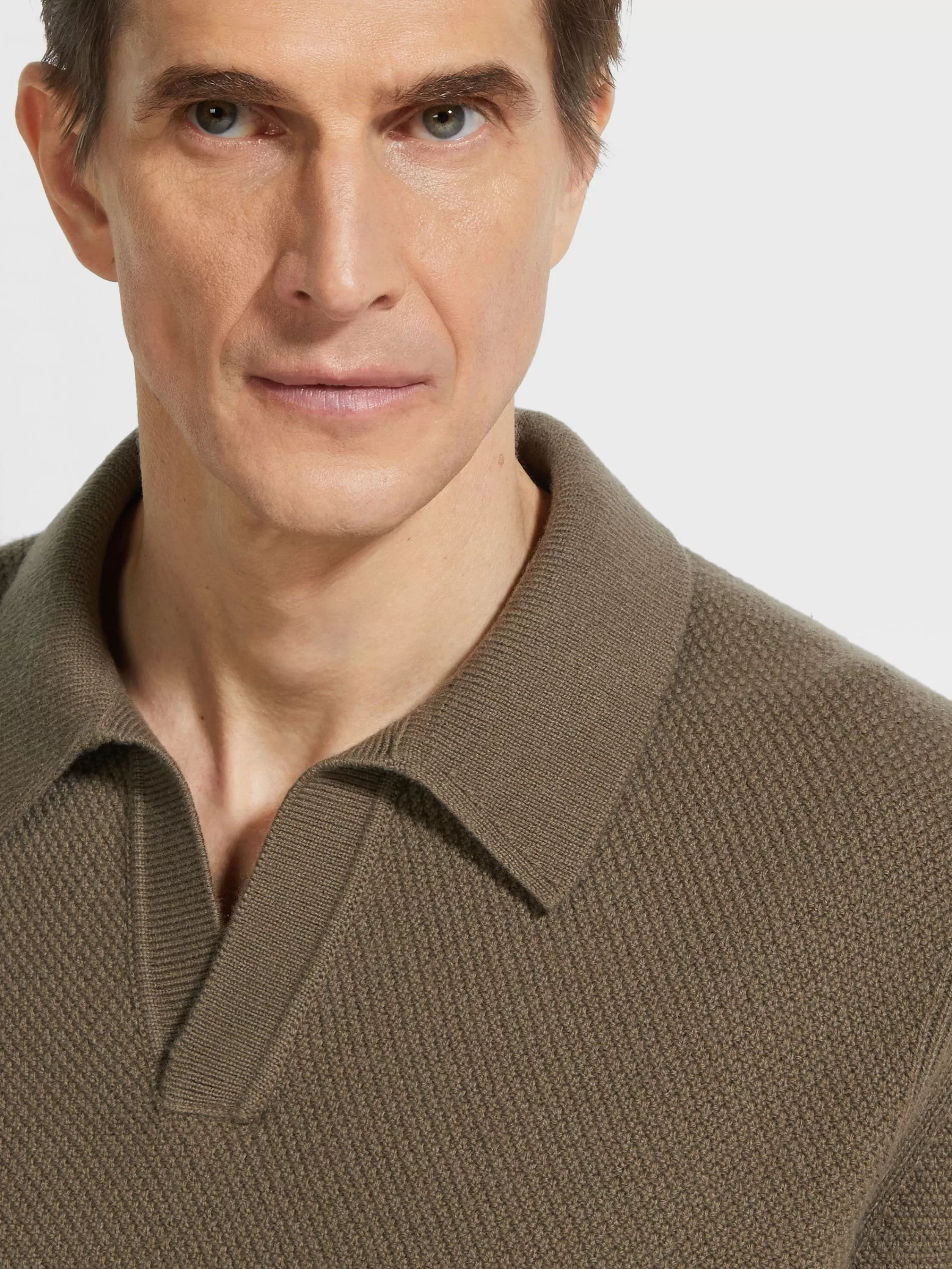 Outlet Poloshirt aus Oasi Cashmere in meliertem, dunklem Khaki Strickwaren
