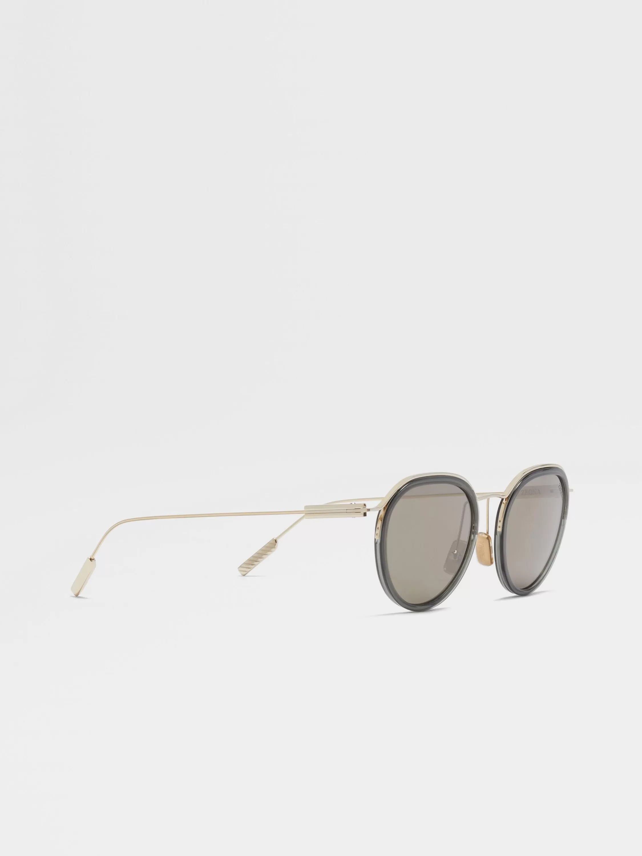 Discount Sonnenbrille aus Acetat und Metall in transparentem Grün und Blassgold Sonnenbrillen