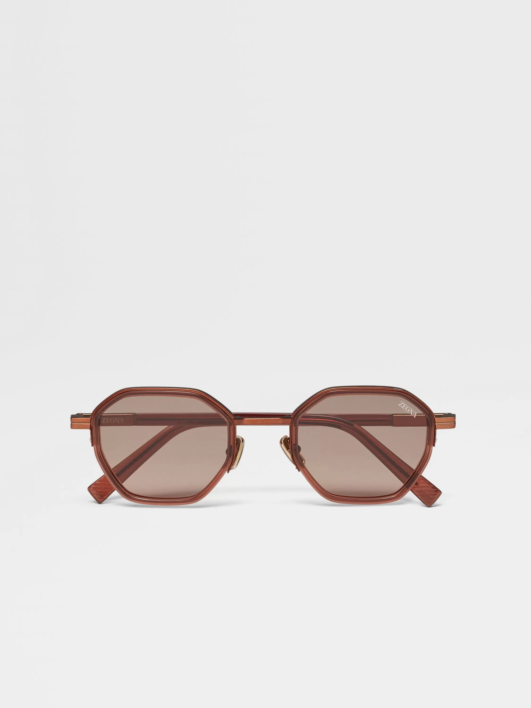 New Sonnenbrille aus Metall und Acetat in transparentem Braun Sonnenbrillen